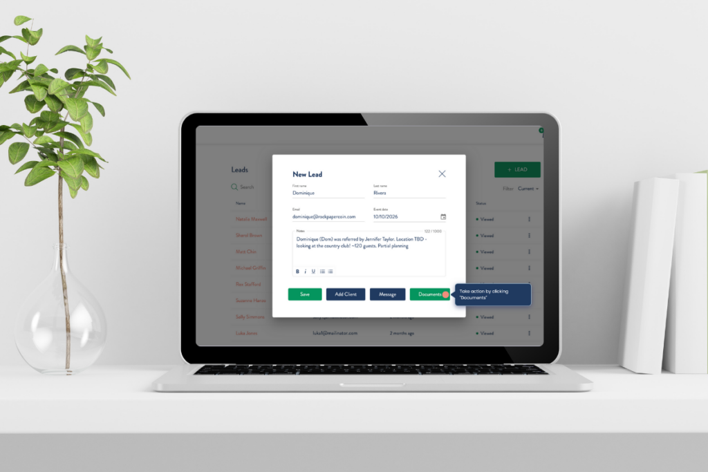 Rock Paper Coin CRM lead entry screen on a laptop with a plant on a white desk