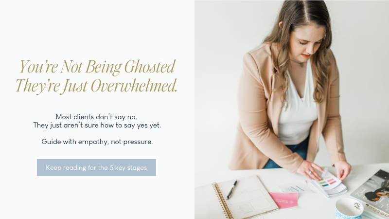 Emily Foster Creative reviewing color swatches at a white desk with brand materials.