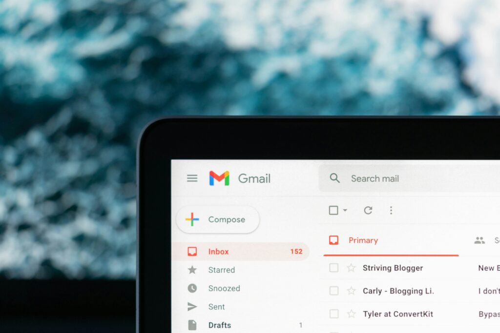 Laptop showing a Gmail inbox, symbolizing client inquiries and follow-up