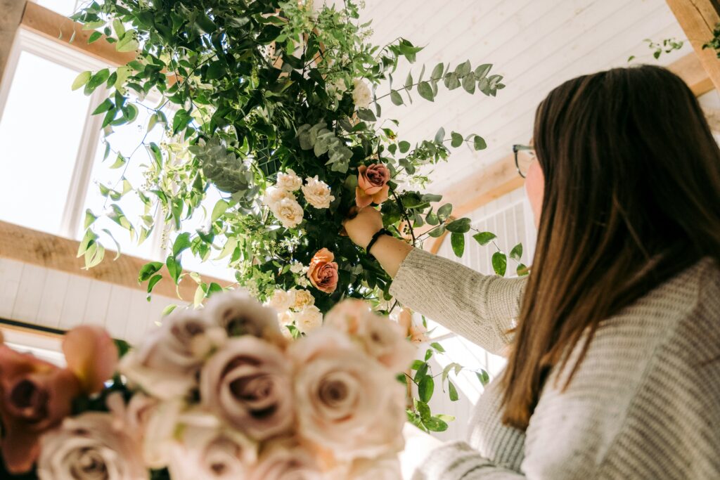 florist brand photo behind the scene fixing florals
