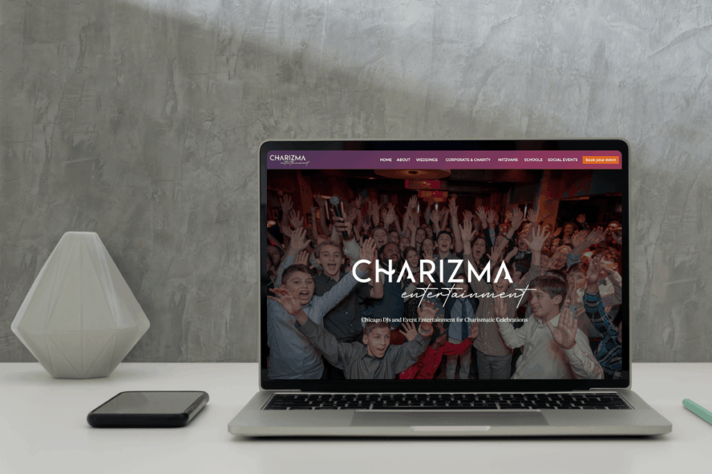 website mockup of Charizma Entartainment, owned by Marz, designed by Emily Foster Creative