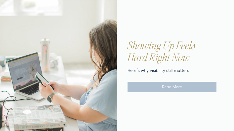 Emily holding her phone and facing a laptop with a graphic text beside