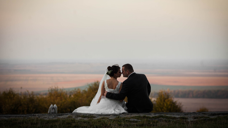 Newlyweds kissing
